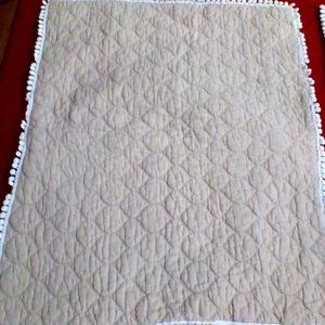 Beige Quilt with White Accents